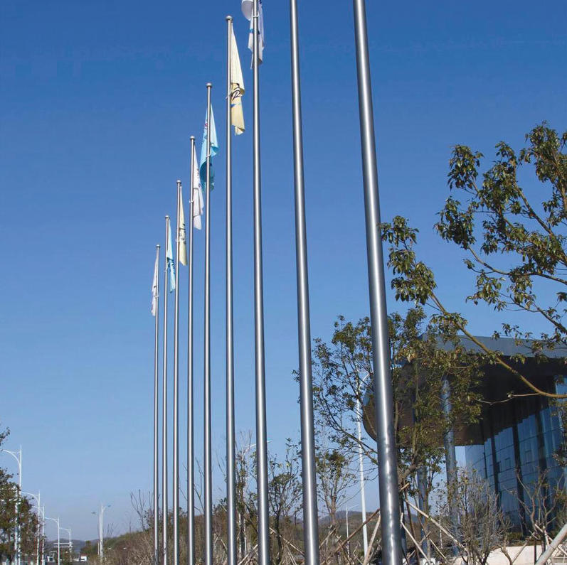 What materials are typically used for outdoor aluminum flagpoles?